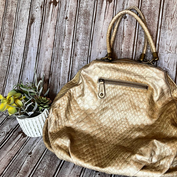 Jessica Simpson Gold Flower handbag - Picture 2 of 3